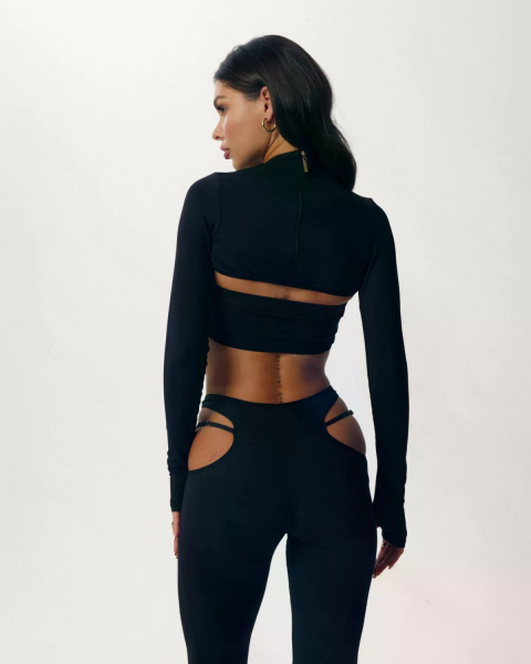 Front shot of model wearing Damascus lingerie set by Promees